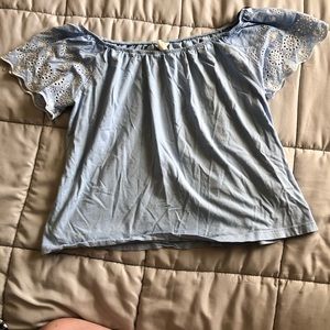 Off the shoulder blue tee shirt